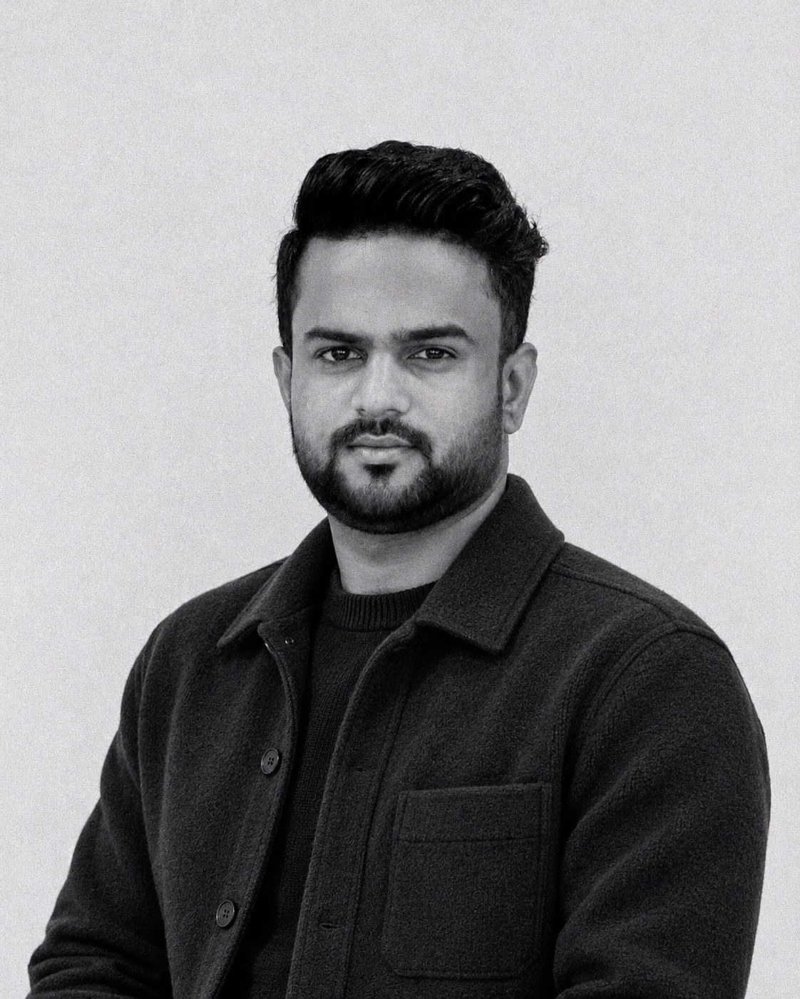 Black and white portrait of Aamir Khairabadi
